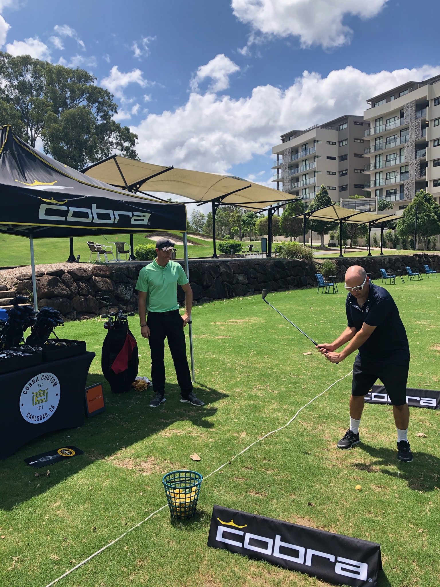 BGQ secretary Neil Herdegen demos the 2020 Cobra wedge at TS Golf Academy on the Gold Coast.